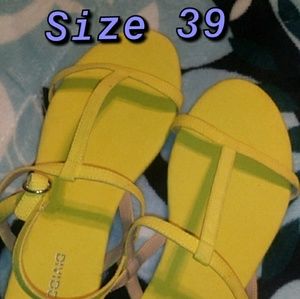 Bright yellow sandals !